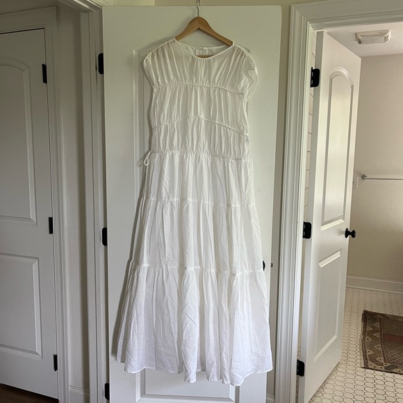 DISSH Dresses & Skirts - Gorgeous white flowy line maxi! BRAND NEW. Never worn